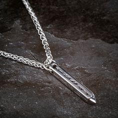 This rectangular pendant is made from stainless steel and features runes from the Elder Futhark. The obelisk design is subtle enough to wear all day, every day, in any setting. This necklace can be worn with either of the four sides pointing out, making it a versatile piece that can be worn with many different outfits. Available with a simple adjustable black cord or stainless steel 24" / 60cm chain Rune Necklace, Elder Futhark, Rope Cord, Different Outfits, Steel Chain, Runes, Stainless Steel Chain, Chain Pendants, The Four