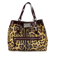 This elegant Dolce & Gabbana Miss Easy Way shopper bag is a timeless classic from the early 2000s. Featuring a bold leopard print in brown and black tones, this bag embodies the brand's signature sophisticated and daring style. Unique details such as the burgundy patent leather trim and handles add a touch of luxury, while the roomy interior makes it perfect for everyday use or a special occasion. Features: Original 2000s Dolce & Gabbana model Leopard print on fabric Burgundy patent leather deta 2000s Bags, Bag 2000s, Print On Fabric, Vintage Designer Fashion, Black Tones, Top Handle Bags, Bags Logo, Shopper Bag, Early 2000s