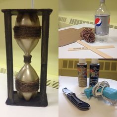 an hourglass with sand and glue next to some crafting supplies on a table