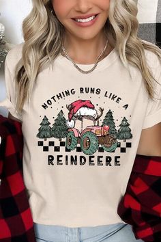 Add a touch of whimsy to your holiday wardrobe with this 'Nothing Runs Like a Reindeer' Christmas unisex graphic tee. This playful tee features a fun and festive design that combines the rugged charm of a tractor with the magic of Santa's reindeer. Crafted from high-quality materials, this tee is comfy and perfect for any day. The unisex fit ensures it's suitable for everyone, and the unique graphic is sure to be a hit at any festive occasion. Made with pride in Nicaragua, this piece offers both Snap Jewelry Charms, Concealed Carry Handbags, Santa's Reindeer, Essential Oil Accessories, Closet Candy Boutique, Plus Swimwear, Christmas Funny, Festive Design, Reindeer Christmas