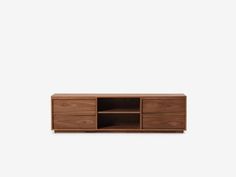 the sideboard is made out of wood and has two open compartments on each side