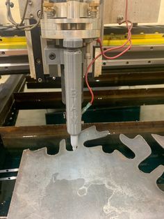 the machine is working on metal parts