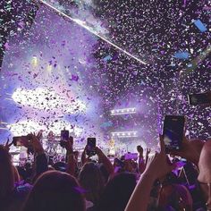 confetti is thrown in the air at a concert