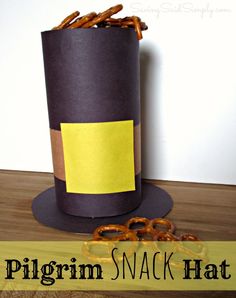 a paper roll hat with pretzels on it and the words, pilgrim snack hat