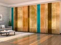 a living room filled with furniture and walls covered in gold foil paint stripes on the wall