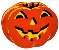 an orange and yellow pumpkin with two faces on it's face, sitting in front of a white background