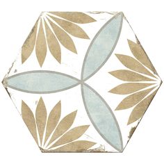 a white and blue tile design with leaves on it's sides, in the shape of a hexagonal pentagon