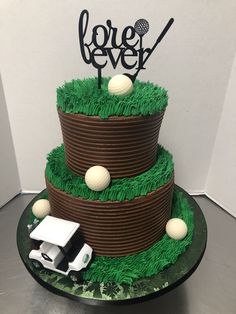 a golf themed cake is displayed on a table