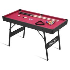 a red pool table with cues and cues on the top, ready to play