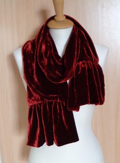 This is gorgeous vintage scarf made of soft dark red silk velvet fabric. Double sided. Tag: Rose Black England 100% Silk Velvet In excellent condition and comes from smoke-free home. Measures: 6.5" x 65" (16.5 cm x 165 cm)  Ruffled ends 13" (33 cm) wide Weight 175 g Thanks for visiting my shop! OLaLaVintage Vintage Red Scarf For Winter, Velour Scarf, Dark Red Scarf, Luxury Red Scarves, Vintage Red Silk Shawl Scarf, Velvet Scarf, Silk Velvet Fabric, Vintage Scarf, Red Silk