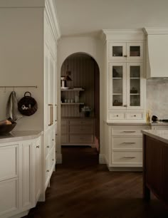 the kitchen is clean and ready for us to use it's counters, cabinets, and cupboards