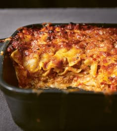 a casserole dish with meat and cheese