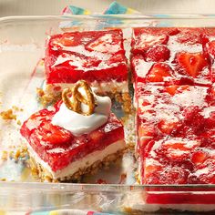 strawberry shortcakes with whipped cream and nuts in a glass dish