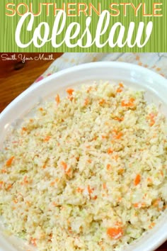 a white bowl filled with coleslaw on top of a wooden table