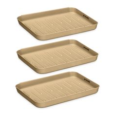 three brown trays sitting on top of each other