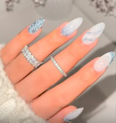 Nail Ideas New Years Sparkle, Christmas Nail Sets Almond, White Nails With Snowflake Design, Light Blue With Snowflake Nails, Ice Blue And Silver Nails, Fun Nye Nails, Winter Baby Blue Nails, Winter Wonderland Nails Blue, Christmas Nails White And Blue