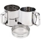 three stainless steel mugs with lids