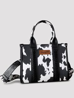 Allover cow print on canvas Whipstitch details Wrangler logo applique on the front Top zipper closure Inside of the bag includes a zippered pocket and 2 open pockets Double round handle (drop: 5.75") Detachable/adjustable cross body strap included 10.5" X 5" X 8.5" (Cross body strap 46" ) Wrangler Tote Bag, Casual Everyday Bag With Cow Print, Casual Cow Print Bags For Daily Use, Wrangler Bag, Cowgirl Core, Cow Print Bag, Country Hats, Wrangler Accessories, Beautiful Braided Hair