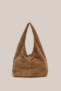 PRE - ORDER Shipping From October 16th , 2024 Crowned by ELLE magazine as the next must-have bag, the Sienna Suede Hobo Bag is a relaxed shoulder bag with a magnetic stud closure at the top. Sienna is the new perfect slouchy tote to elevate your everyday. Please see product image for most accurate colour. Our VESTIRSI Suede Hobo Bag, Luxury Street Style, Slouchy Tote, Suede Tote Bag, Slouchy Bag, Fall Bags, Suede Bag, Work Tote Bag, Suede Tote