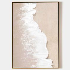 an abstract painting in beige and white with waves on the bottom right corner, framed against a neutral background