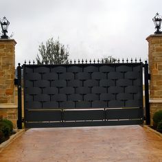 a black gate with the words most popular on it and an image of a brick wall behind it