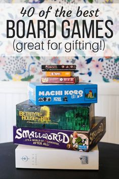 a stack of board games sitting on top of a table with text overlay that reads, 40 of the best board games great for gifting