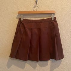 New With Tags. Wild Fable Womens Size Extra Small Skater Tenis Box Pleats Skirt Color Brown. Materials Include Polyester, Rayon, And Spandex. Semi A-Line Style Mini Skirt With Zipper Closure. Makes For A Cute Outfit For Any Season. Approximate Measurements: Waist: 14.5 Inches Length: 15 Inches Thank You! Fitted Brown Pleated Tennis Skirt, Brown Lined Mini Skort, Retro School Skort With Lined Skirt, Fitted Brown Tennis Skirt, Fitted Brown Lined Tennis Skirt, Brown Pleated Tennis Skirt, Casual Brown Pleated Skort, Brown School Skirt For Fall, Brown Skirt For School In Fall