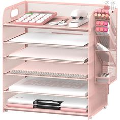 a pink desk organizer with lots of drawers