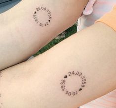 two people with matching tattoos on their legs, one has the word love written in small letters