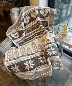 a chair with a blanket on top of it