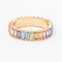 Add a pop of color to your ring collection! This gold-tone ring features a baguette design of rainbow stones in emerald cut shapes. Sizes Available: 6, 7, 8, 9 Finish: Gold-tone Material: Metal - Claire's Gold Rainbow Baguette Ring Girly Rings, Rainbow Rings, Baguette Ring, Rainbow Jewelry, Jewelry Hair, Fashionable Jewelry, Jewelry Essentials, Ring Collection, Cool Gadgets To Buy