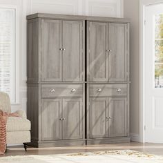 a living room with a chair, armoire and large cabinet in the middle of it