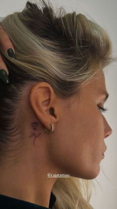 a woman with ear piercings on her ears