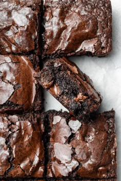 chocolate brownies cut into squares and stacked on top of each other