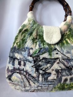 a handbag made out of fabric and wood