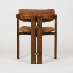 a chair that is made out of wood and leather