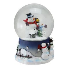 a snow globe with two snowmen inside it