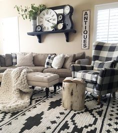 a living room filled with furniture and a clock on the wall