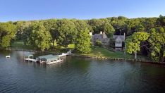 Lakefront Properties With Amazing Views | Lakefront Bargain Hunt | HGTV Michigan Lake House, Hill Landscaping, Nature House, Boat Docks, Lake Houses Exterior, Houses Exterior, Lake Ideas, Lakefront Property, Mountain House Plans