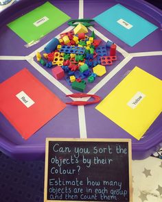 a purple tray filled with lots of colorful legos