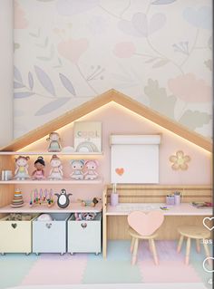 a doll house with pink walls and furniture