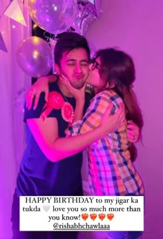 a man and woman hugging each other in front of balloons with the caption happy birthday to my juggar ka ruka love you so much more than