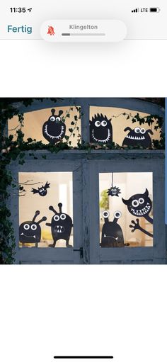 an image of some cartoon characters in the window