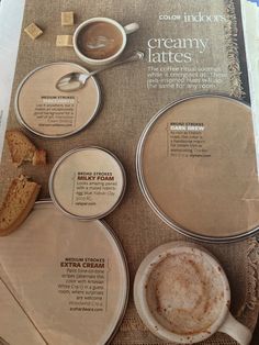 an advertisement for creamy lattes on a table