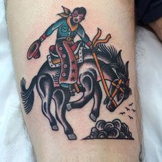 a man is sitting on top of a horse with an arrow in his hand and holding a spear