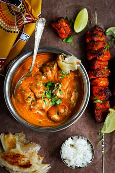 the food is prepared and ready to be eaten on the table with other dishes around it