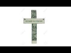 a cross with the words in god we trust on it