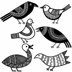 three black and white birds with designs on them