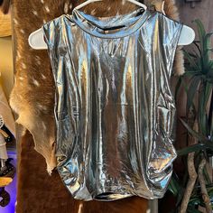 Trendy Metallic Silver High Neck Cropped Top. Brand New With Tags Never Worn!!!!! This Top Pairs Perfect With Metallic Silver Cargo Pants (Check Out My Other Listing). Perfect For Concert!!! Disco Style Shiny Tops For Night Out, Metallic Top With Sheen For Night Out, Metallic Sheen Tops For Night Out, Metallic Sheen Top For Night Out, Metallic Shiny Disco Top, Trendy Shiny Summer Tops, Spring Disco Shiny Tops, Shiny Disco Tops For Summer, Metallic Shine Tops For Night Out