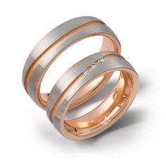 two wedding bands with diamonds on each one in rose gold and white gold, set against a plain background